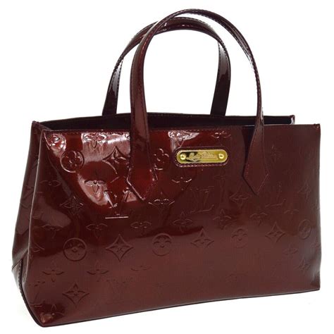 non leather louis vuitton bags|louis vuitton shiny leather bag.